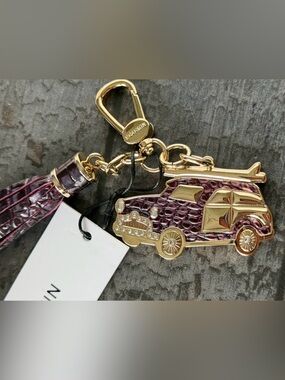 BRAHMIN COPA CAR CHARM TASSEL in  FIG  JAM MELBOURNE NWT $125